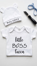 Ivory Heir personalized newborn bodysuit and matching bear-ear beanie hat custom stamped with the name Lucca.